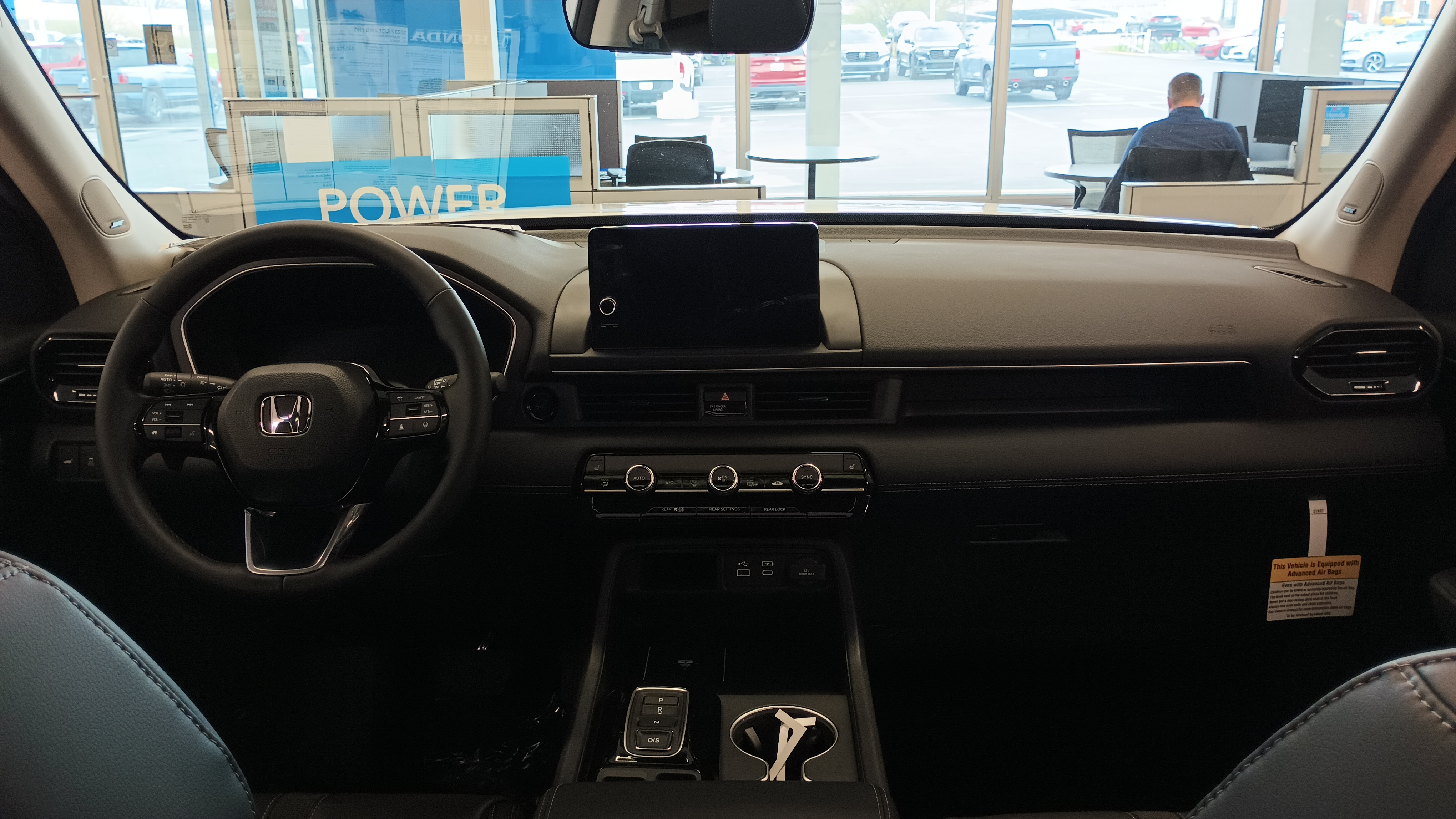 Is a Honda Pilot Considered a Standard SUV? Why Classifications Differ 2023 Honda Pilot interior showing the cabin of the midsize three-row SUV