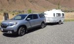 Can a Honda Ridgeline tow a side by side?