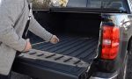 How do I know how much weight I can put in my truck bed?