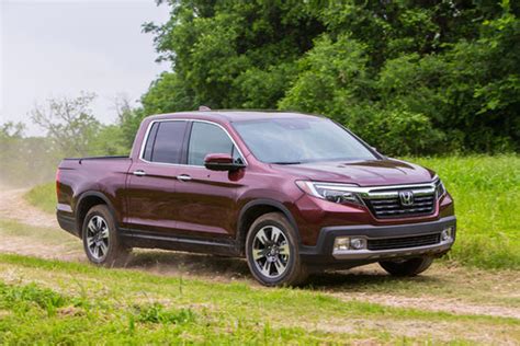 How do you turn on the AWD on a Honda Ridgeline?