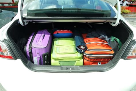How many suitcases fit in an Altima?
