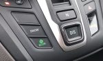What does the snow button do on Honda Pilot?