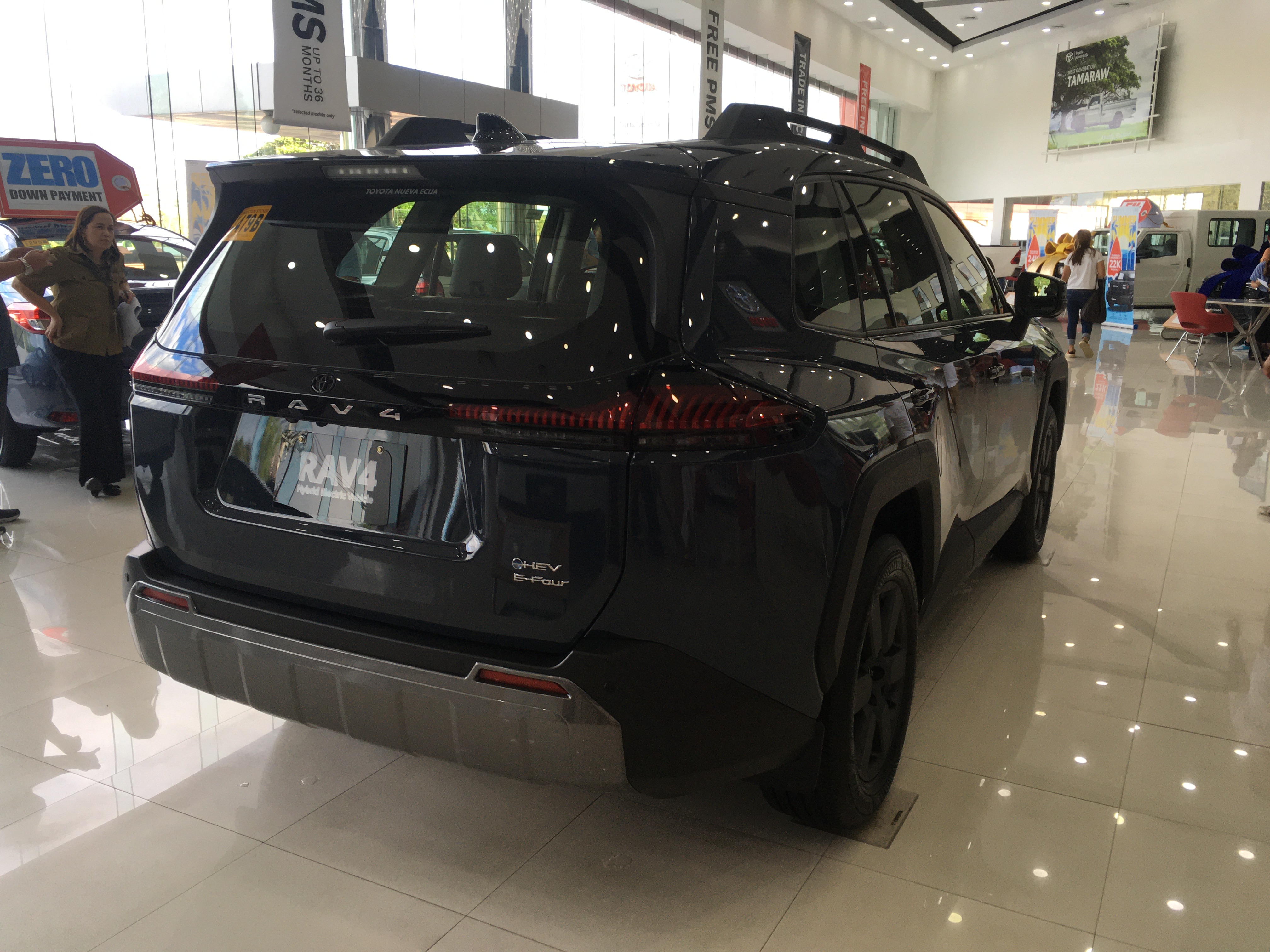 2026 Toyota RAV4 Towing Capacity: Which Trims Can Tow 3,500 lb? 2026 Toyota RAV4 Woodland HEV AWD rear three-quarter view